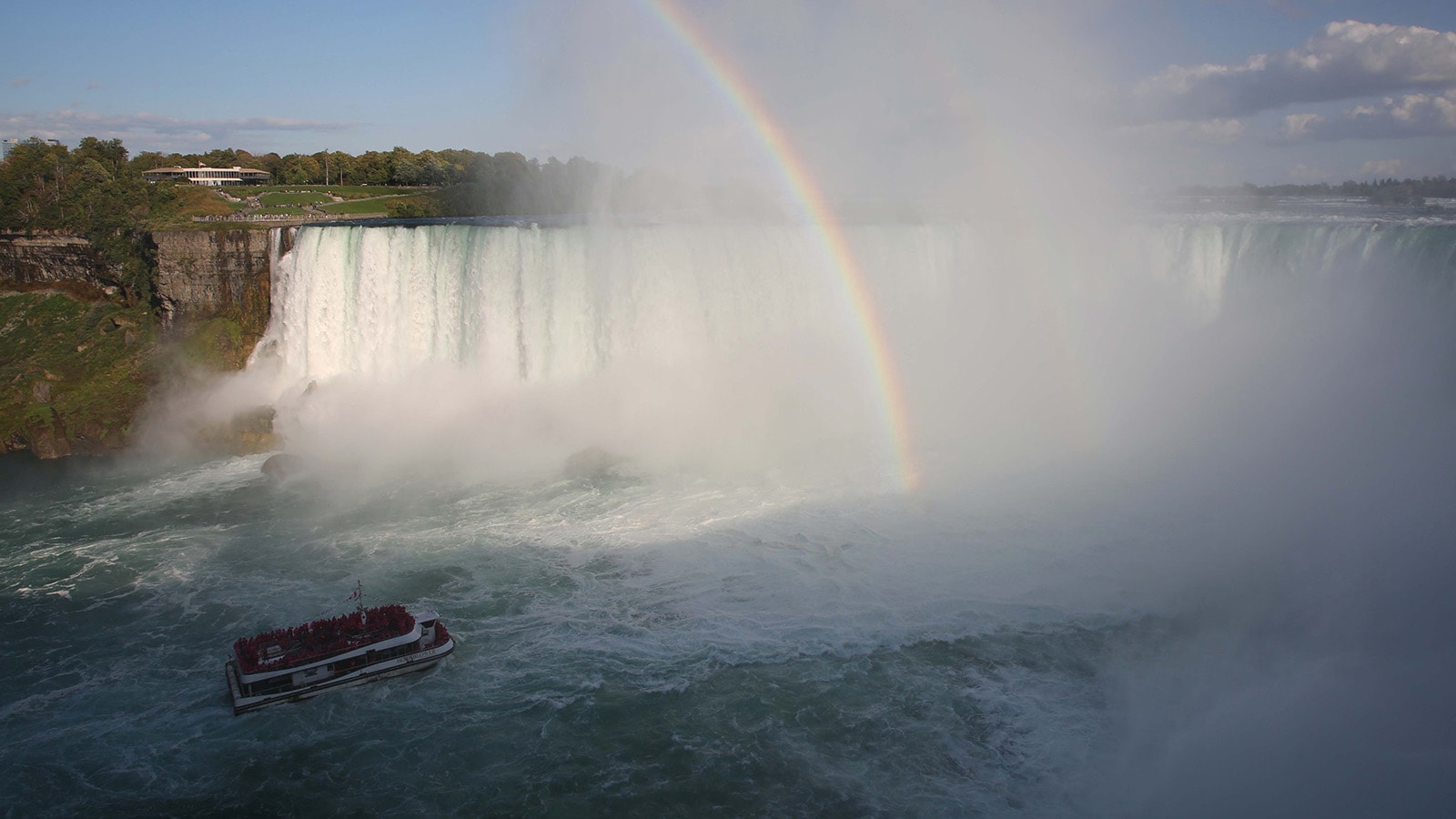 A boat operated by Hornblower Niagara Cruises ventures to the edge of Horseshoe Falls.