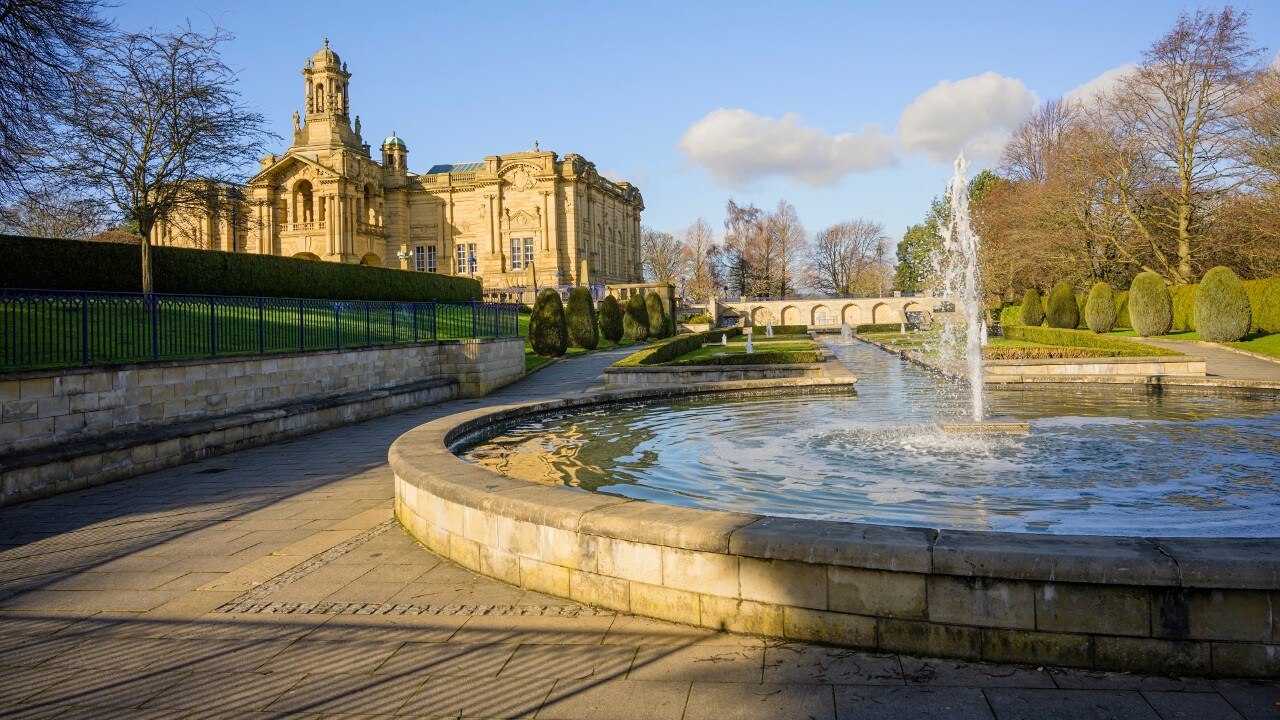 Cartwright Hall in Lister park, Bradford, Yorkshire viewed from the Mughal water gardens.