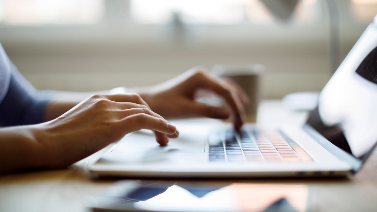 Woman using her laptop for working from home
